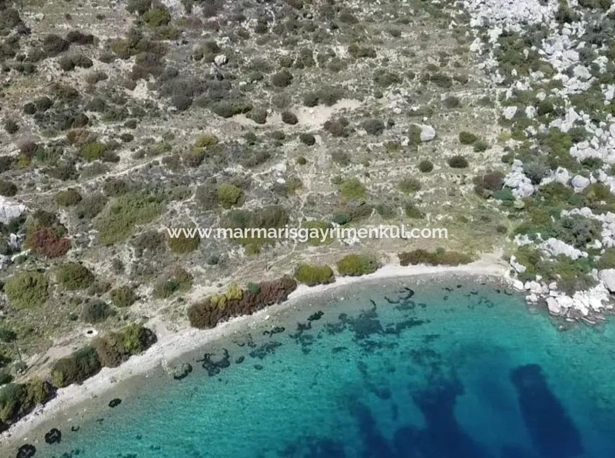 Grundstück Mit Meerblick Zum Verkauf Im Dorf Söğüt Im Bezirk Marmaris, Geeignet Für Investitionen 50 Meter Vom Meer Entfernt