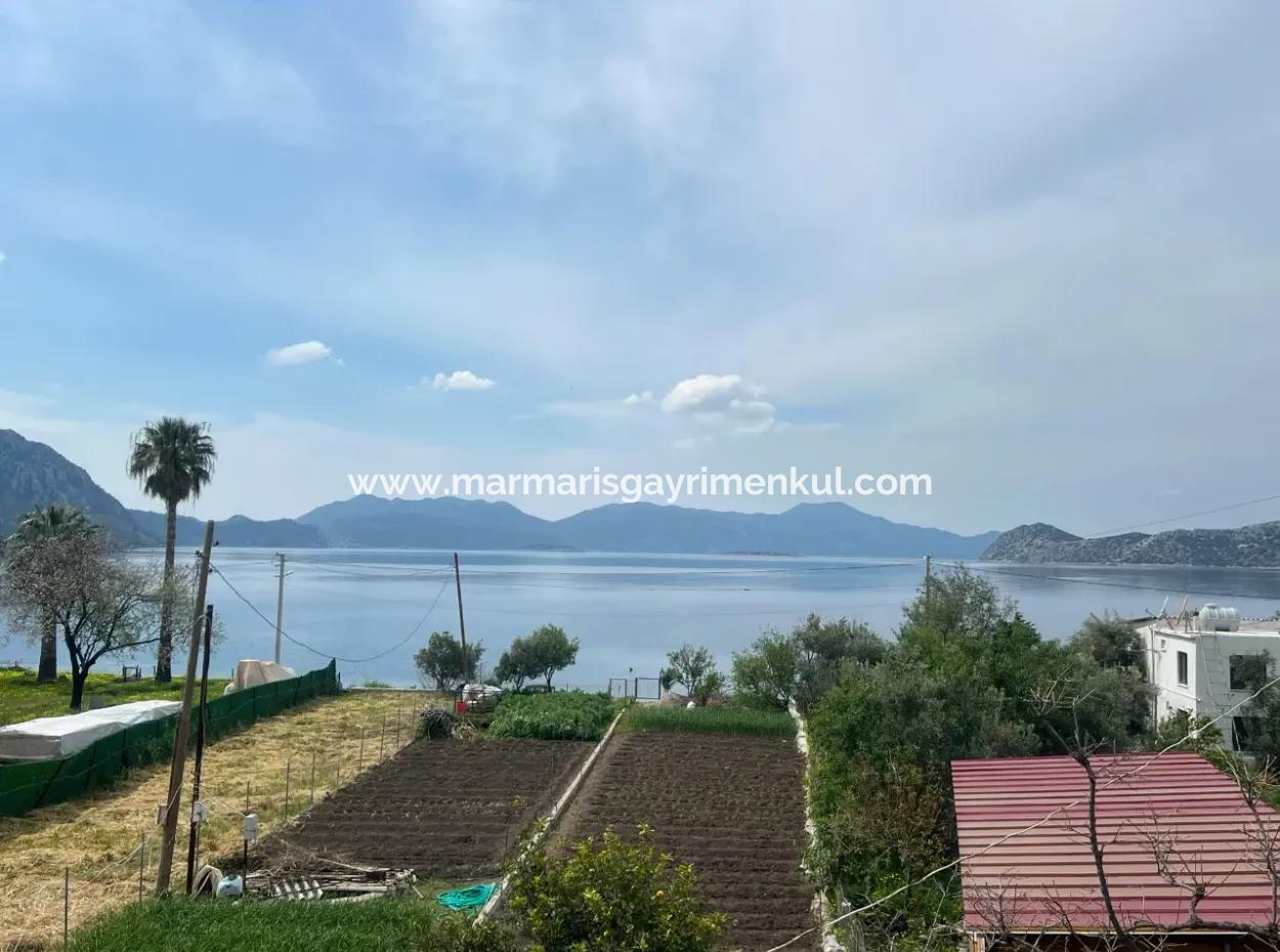 Detached House For Sale On 2000M2 Plot Of Land By The Sea In Marmaris Söğüt Neighborhood. Suitable For Tying A Boat In Front Of It.