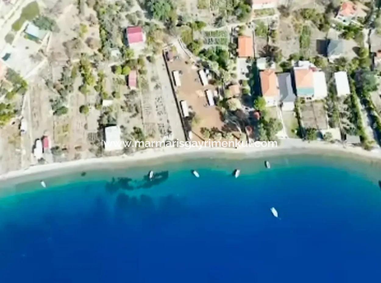 Detached House For Sale On 2000M2 Plot Of Land By The Sea In Marmaris Söğüt Neighborhood. Suitable For Tying A Boat In Front Of It.