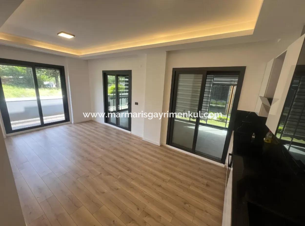 Luxury Apartment For Sale In A Stylish Complex In The Center Of Marmaris, With Ground Floor, Garden, 3 Rooms, 1 Living Room, Parking Lot