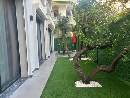 в Marmaris Çıldır, 30 m до моря, новый роскошный, с садом, меблированный, аренда 2+1