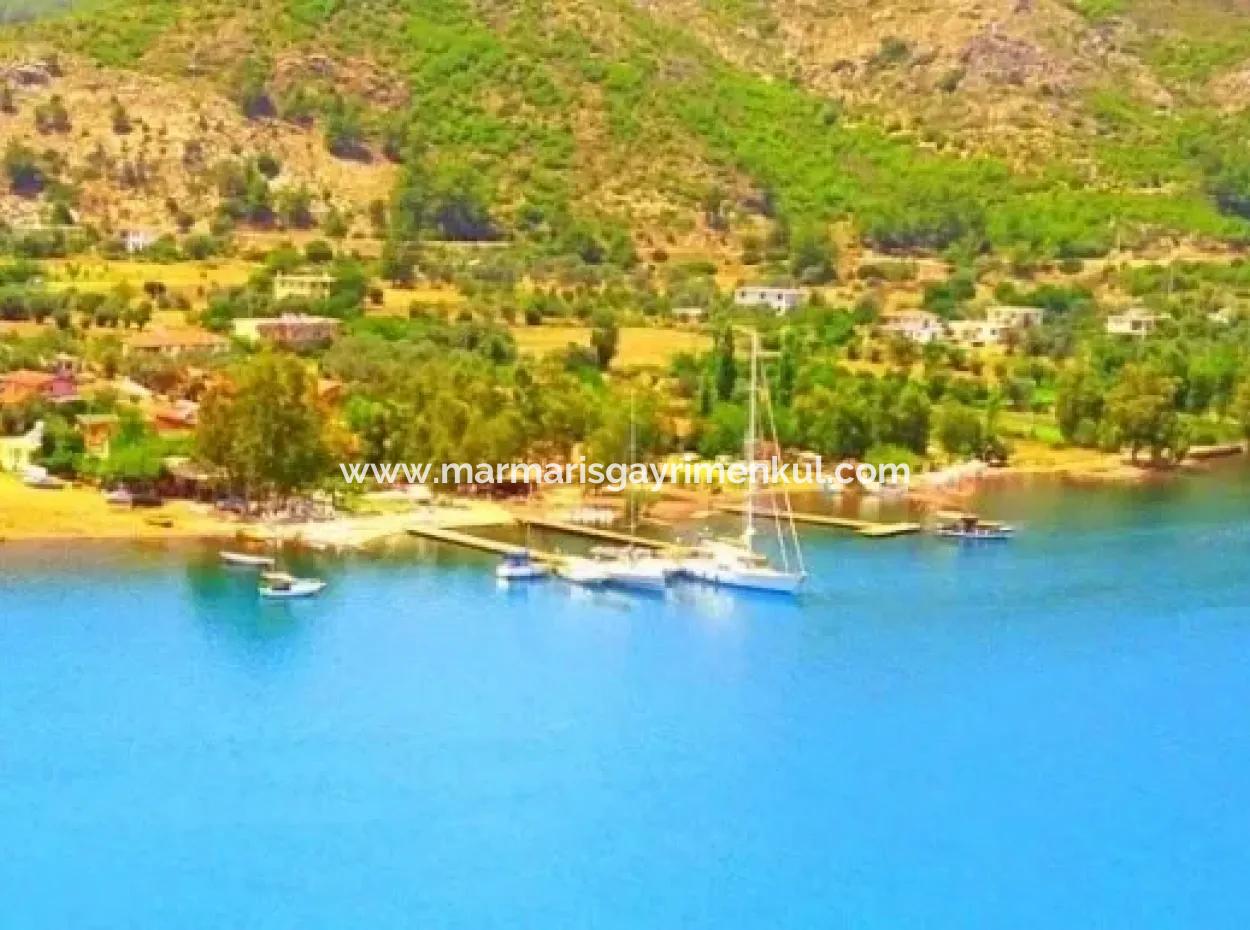 Marmaris Orhaniye Köyünde Denize Sıfır 3500M2 Turizm Yatırımı İçin Uygun Arsamız Satılıktır.