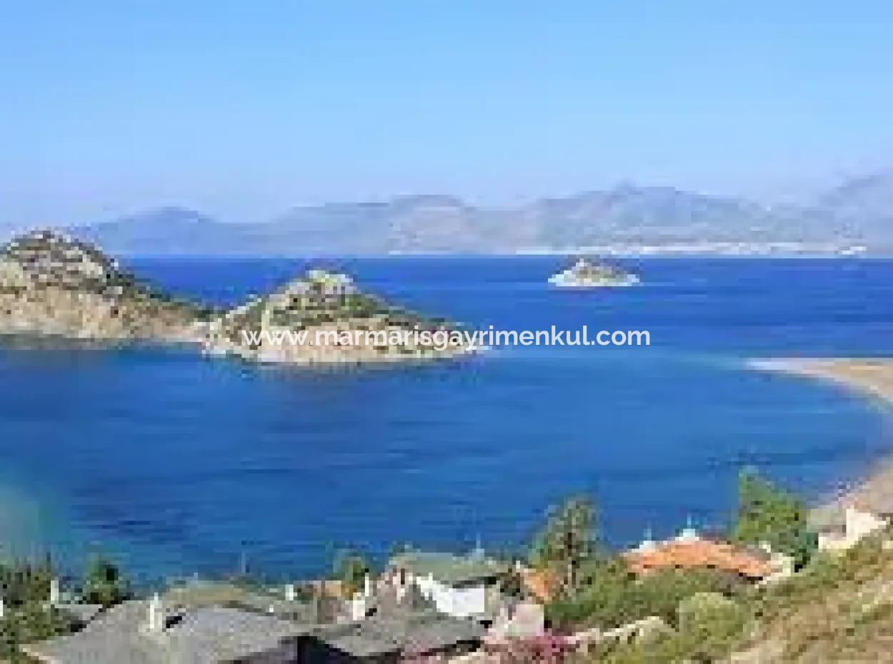 Datça İlçesi Kızlan Mevkisinde Denize Sıfır 10000M2 Turizm İmarlı Denize Sıfır Otel Yapımına Uygun Satılık Arsa