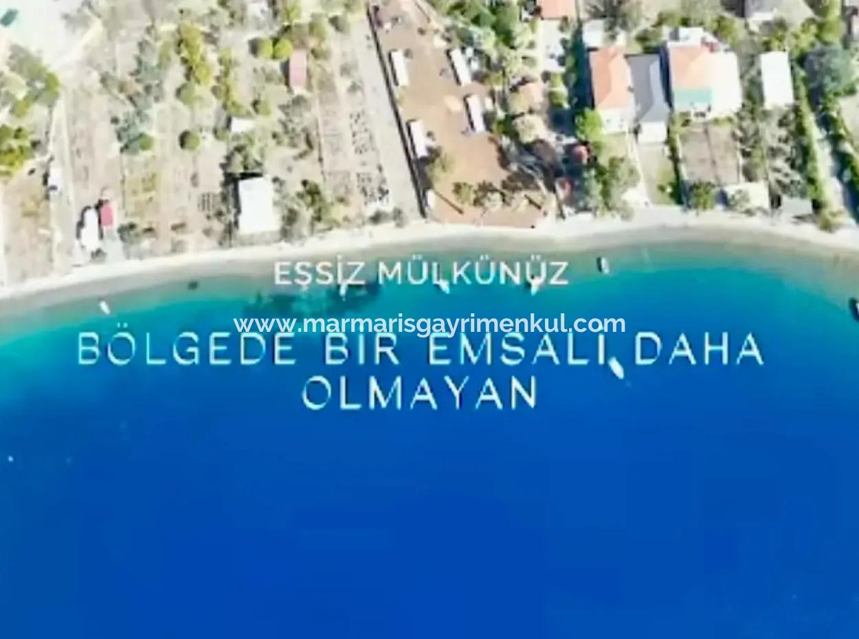Marmaris Söğüt Mahallesi Denize Sıfır 2000M2 Arsa Satılık Müstakil Ev.önüne Tekne Bağlamaya Uygun.